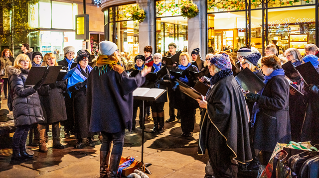 A choir performing on the streets of York as Christmas approaches.